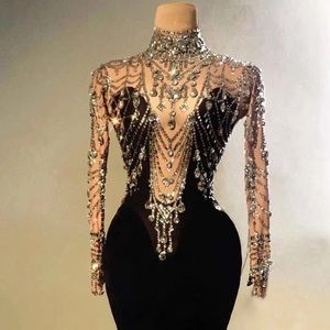 Black gown with diamonds on it. It’s non see-through.